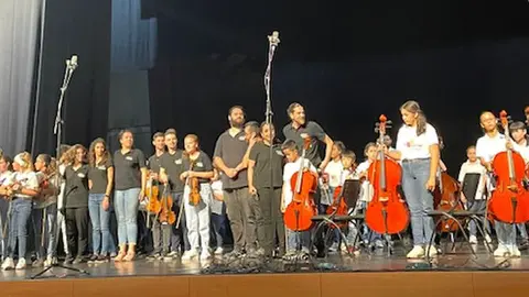 Acto de Barrios Orquestados.